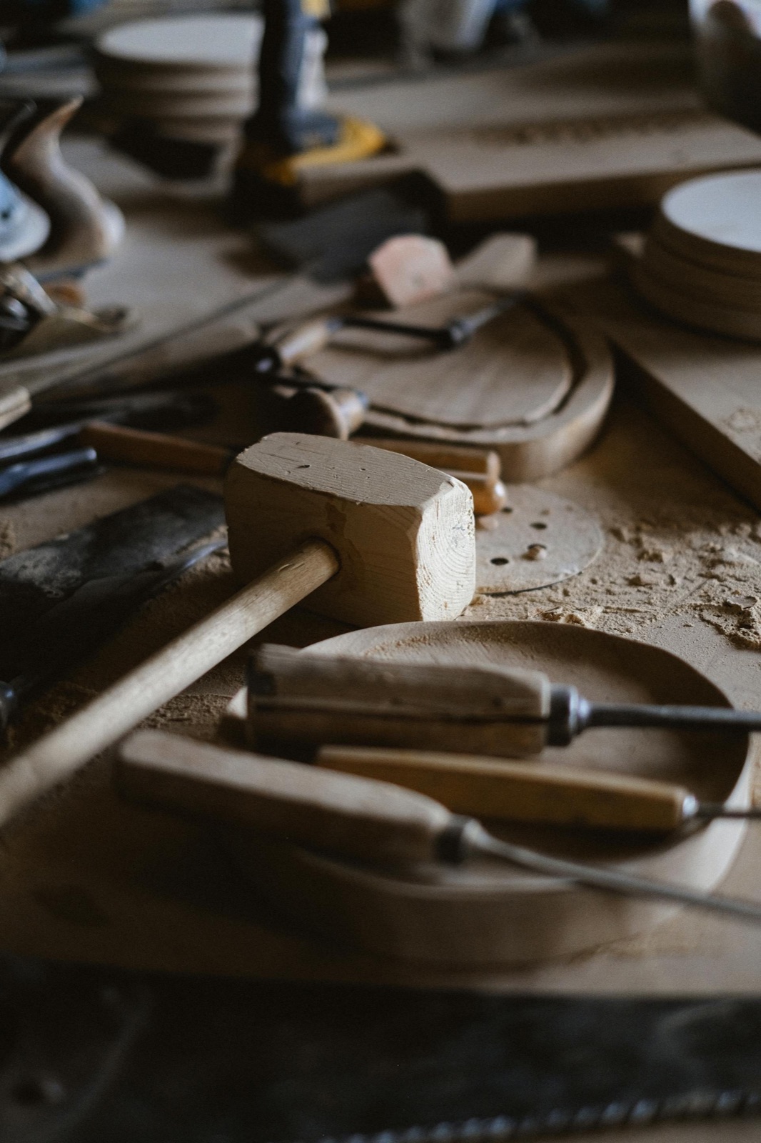 Professional carpentry tools laid out on a workbench